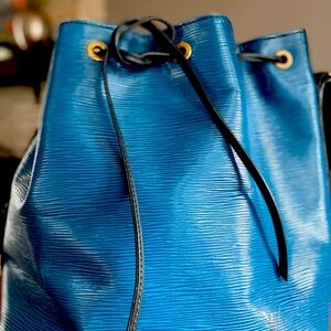 Louis Vuitton Epi leather blue bucket bag.